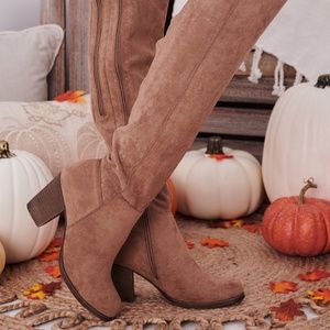 These Taupe Over The Knee Boots Were Made To Have